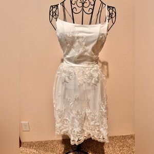 White dress with lace and lace up back